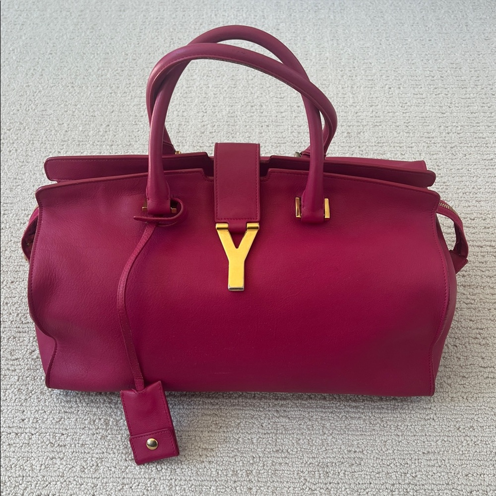 YSL top handle tote.  Fuscia pink. Good condition with normal wear and tear.
